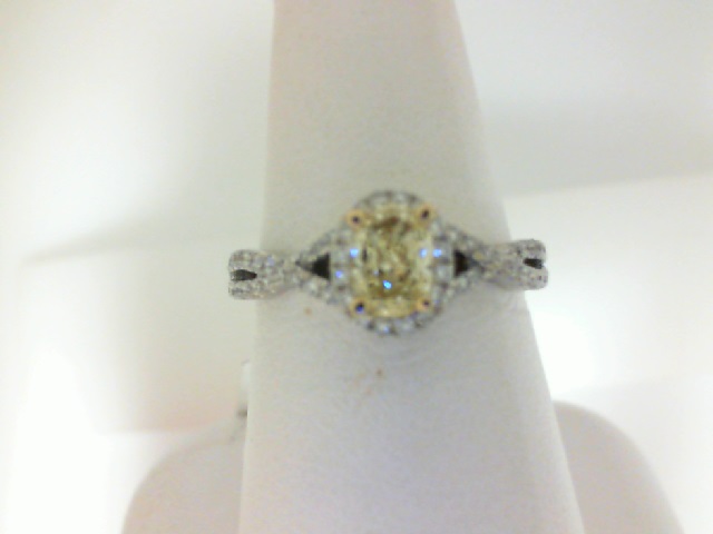 18 Karat Yellow/White Engagement Ring With One 0.41Ct Oval Fancy Yellow Diamond And 0.45Tw Round Diamonds