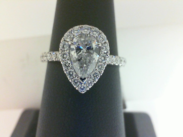 14 Karat White Gold Ring With One 0.73Ct Pear H I1 Diamond And 30=0.45Tw Round Diamonds