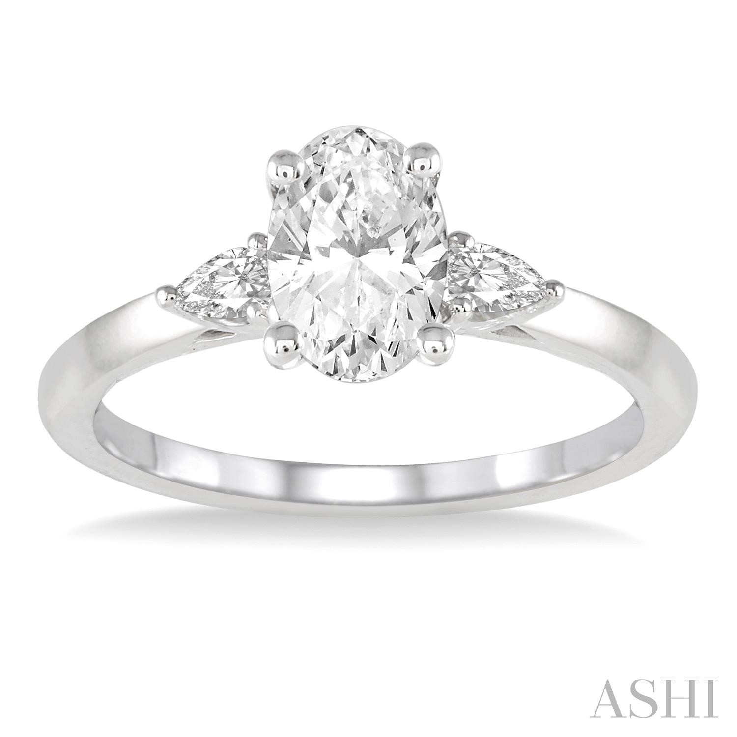 14 Karat White Gold 0.45 Ct Oval Brilliant Cut Diamond Enagement Ring With Pear Shape Diamond Sides 0.25 Ct