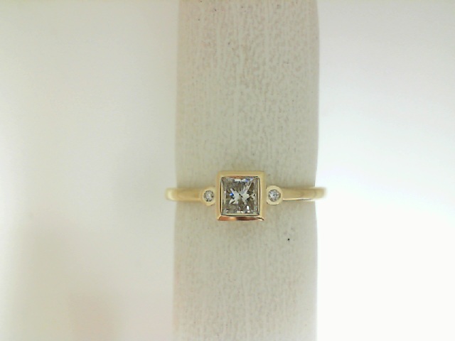 14 Karat Yellow Gold Bezel Set Princess And Round Brilliant Cut Diamond Ring 0.37 Ct
Size 7