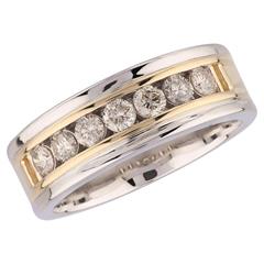 14 Karat Yellow/White Gold Channel Set 7.5mm Wedding Band With 7=0.87Tw Round Diamonds 
Ring Size: 10.25
