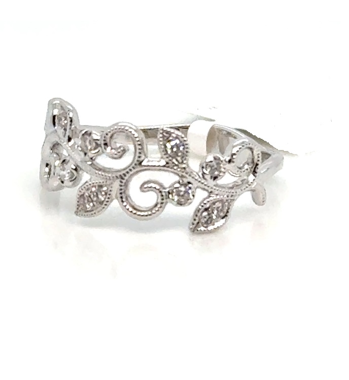 18 Karat White Gold Milgrain Open Filigree Fashion Ring With 13=0.14Tw Round Diamonds 
Ring Size: 6.5