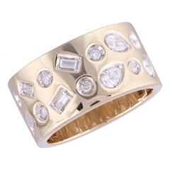 14 Karat Yellow Gold 14 Karat 10mm Wide Band With 4=0.13Tw Baguette  Diamonds, 7=0.16Tw Round Diamonds And 0.293 Twt Pear Diamonds 
Ring Size: 7.5