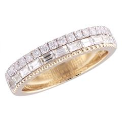 14 Karat Yellow Gold 14 Karat  2 Row With Beading Ring With 11= Baguett Diamonds And 18=0.33Tw Round Diamonds
Ring Size: 7.5