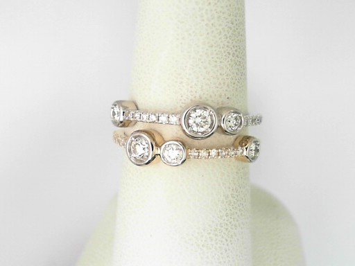 14 Karat Yellow Gold And Platinum Round Brilliant And Single Cut Diamond Ring 0.49 Cts
Ring Size: 7.5