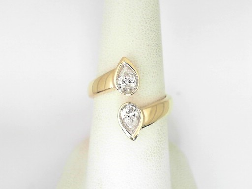 14 Karat Yellow Gold Pear  Cut Diamond Bypass Ring 0.62 Cts
Ring Size: 7.5