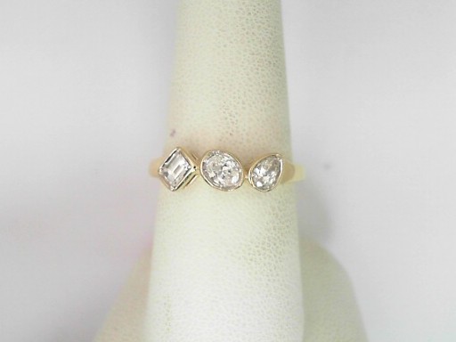 14 Karat Yellow Gold Multi Shaped Cut Diamonds Ring 0.49 Cts
Ring Size: 7.5