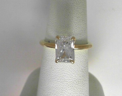 Gabriel & Co 14 Karat Yellow Gold Radiant Cut With Diamond Collar 0.05 Ct Engagement Ring  
Ring Size 6.5