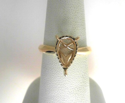 14 Karat Yellow Gold Semi-Mount With 20=0.10Tw Round Diamonds
Ring Size 6.5