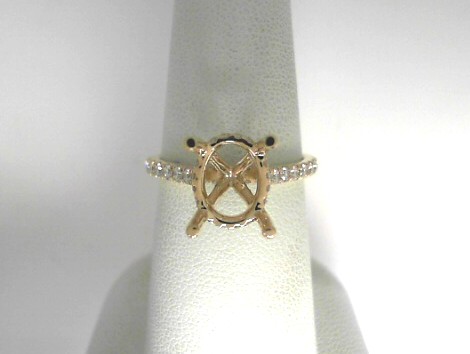14 Karat Yellow Gold Semi-Mount With 68=0.56Tw Round Diamonds
Ring Size 6.5