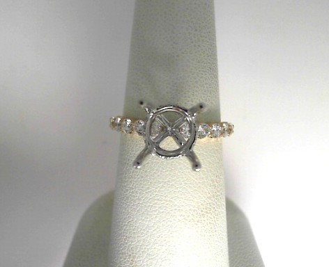 14 Karat Yellow and White Gold Semi-Mount With 26=0.57Tw Round Diamonds
Ring Size 6.5