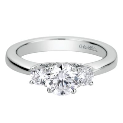 Gabriel & Co:14 Karat White Gold Three Stone Semi-Mount Ring With 2 Round Brilliant G/H Si1-2 Diamonds at 0.34 Total Diamond Weight 
*Setting only, center stone not included