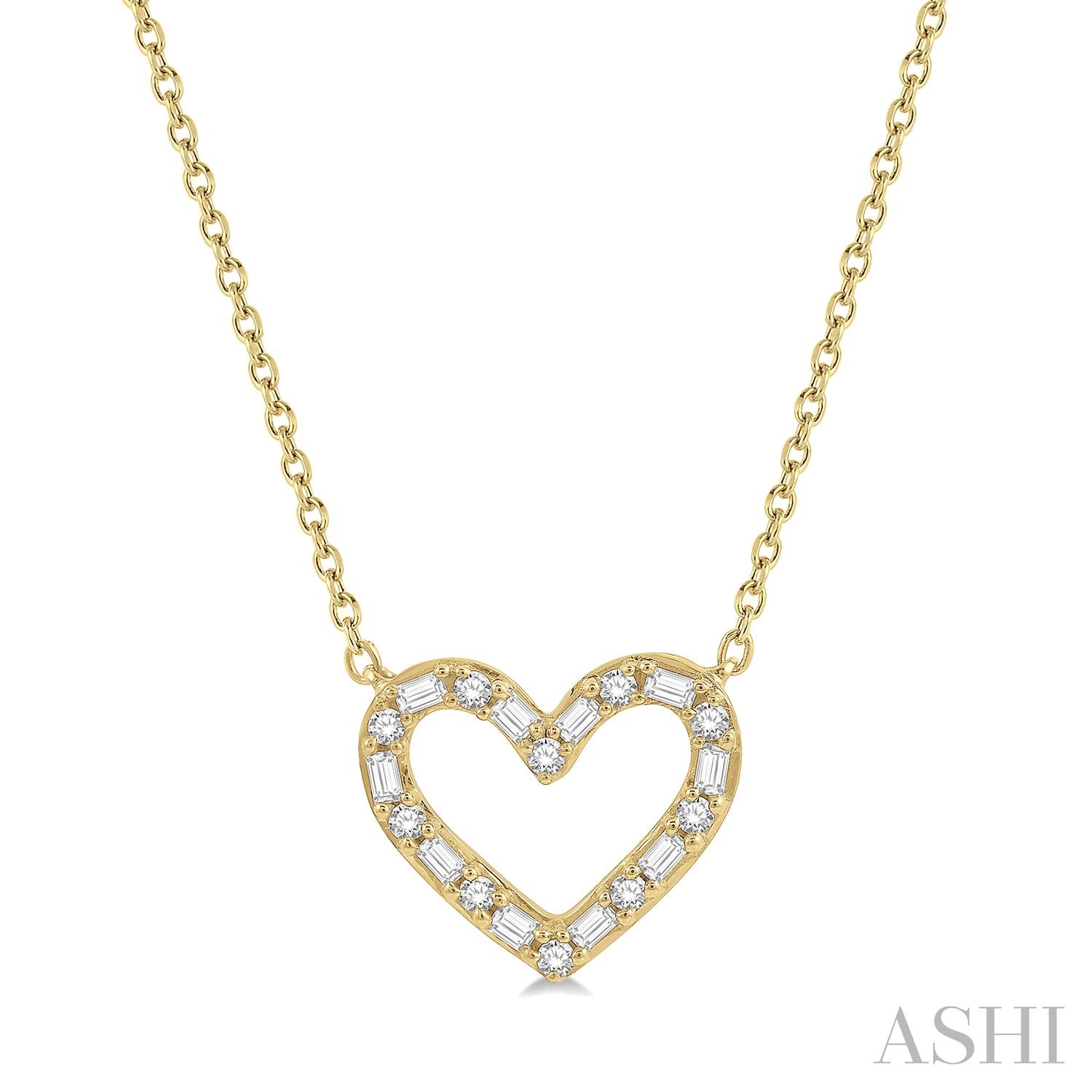 14 karat yellow gold round and baguette cut 0.25 ct diamond heart 18 inch