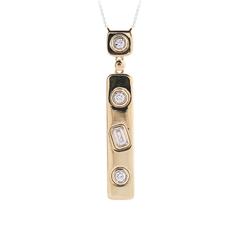 14 Karat Yellow Gold   Verticle Drop Pendant With 0.11Ct Baguette  Diamond And 3=0.14Tw Round Diamonds
Length: 18