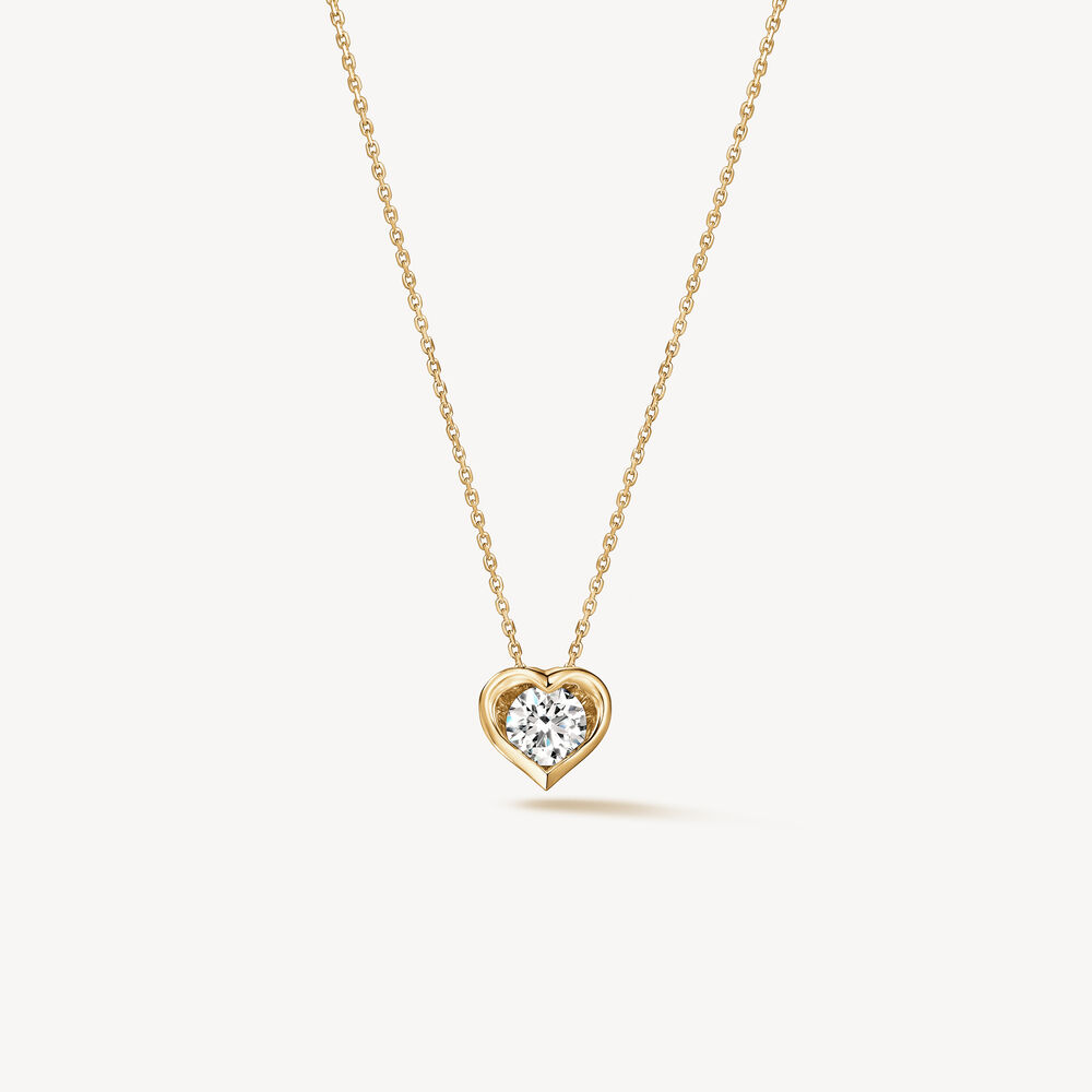 Hearts On Fire 18 Karat Yellow Gold Whimsical Heart Single Diamond Pendant 0.24ct
17 inch