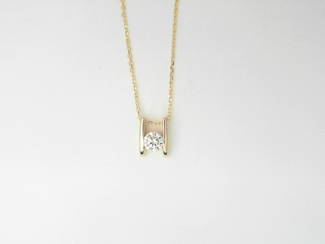 14 Karat Yellow Gold Round Brilliant Cut Diamond Pendant 0.30 Cts 
Length: 18 Inch