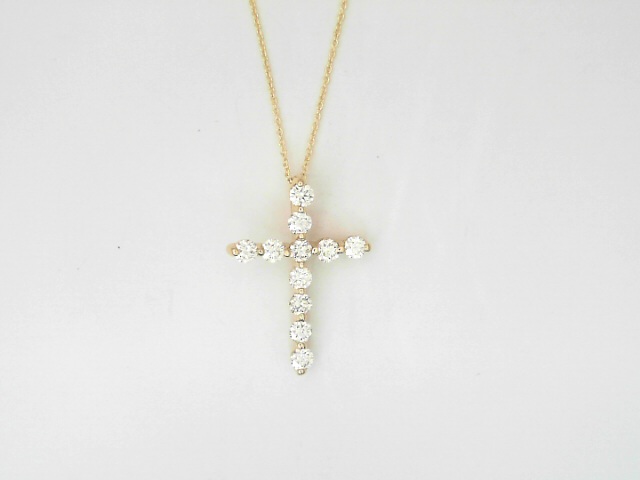 14 Karat Yellow Gold Round Brilliant Cut Diamond Cross 0.72 Cts 
Length: 18 Inch