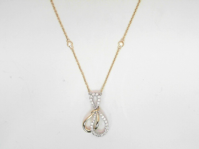 14 Karat Yellow Gold Round Brilliant Cut And Single Cut Diamond Pendant 0.37 Cts
Length: 16 - 18 Inch