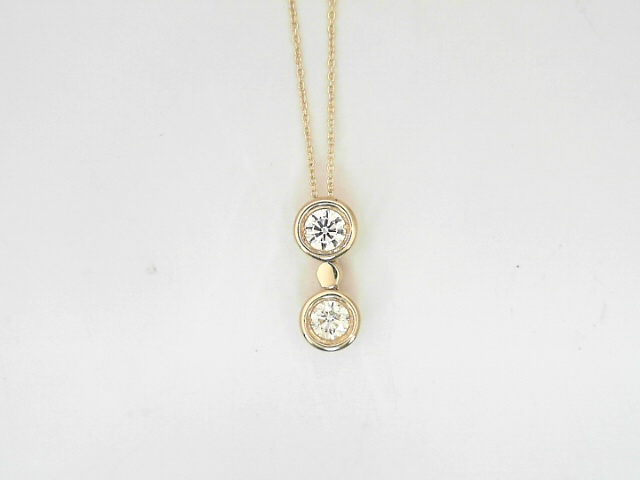 14 Karat Yellow Gold Round Brilliant Cut Diamond Pendant 0.69 Cts
Length: 18 Inch