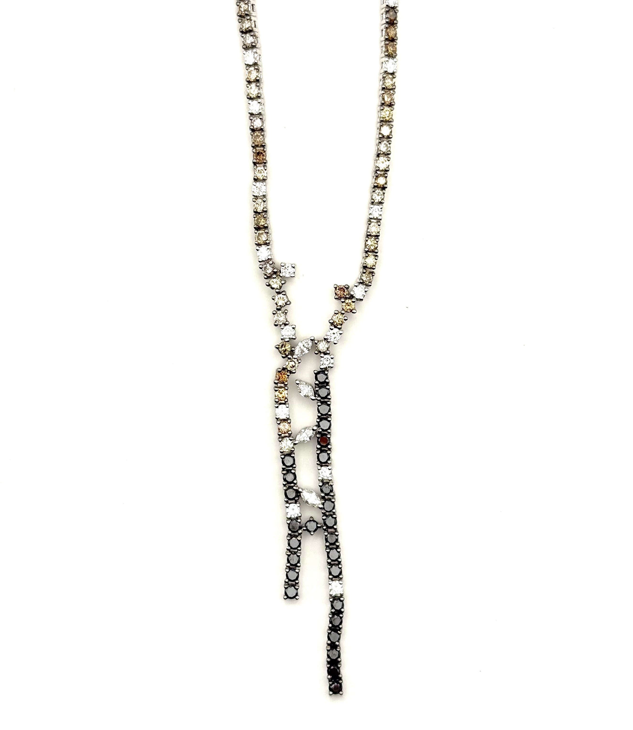 Ackerman Signature Collection: 18 Karat White Gold Necklace With 4=0.33tw Marquise Diamonds, 16=0.74tw Round Diamonds, 27=1.35tw Round Black Diamonds And 100=4.89tw Round Brown Diamonds
Brown 4.89ct and Black 1.35ct Length: 16 