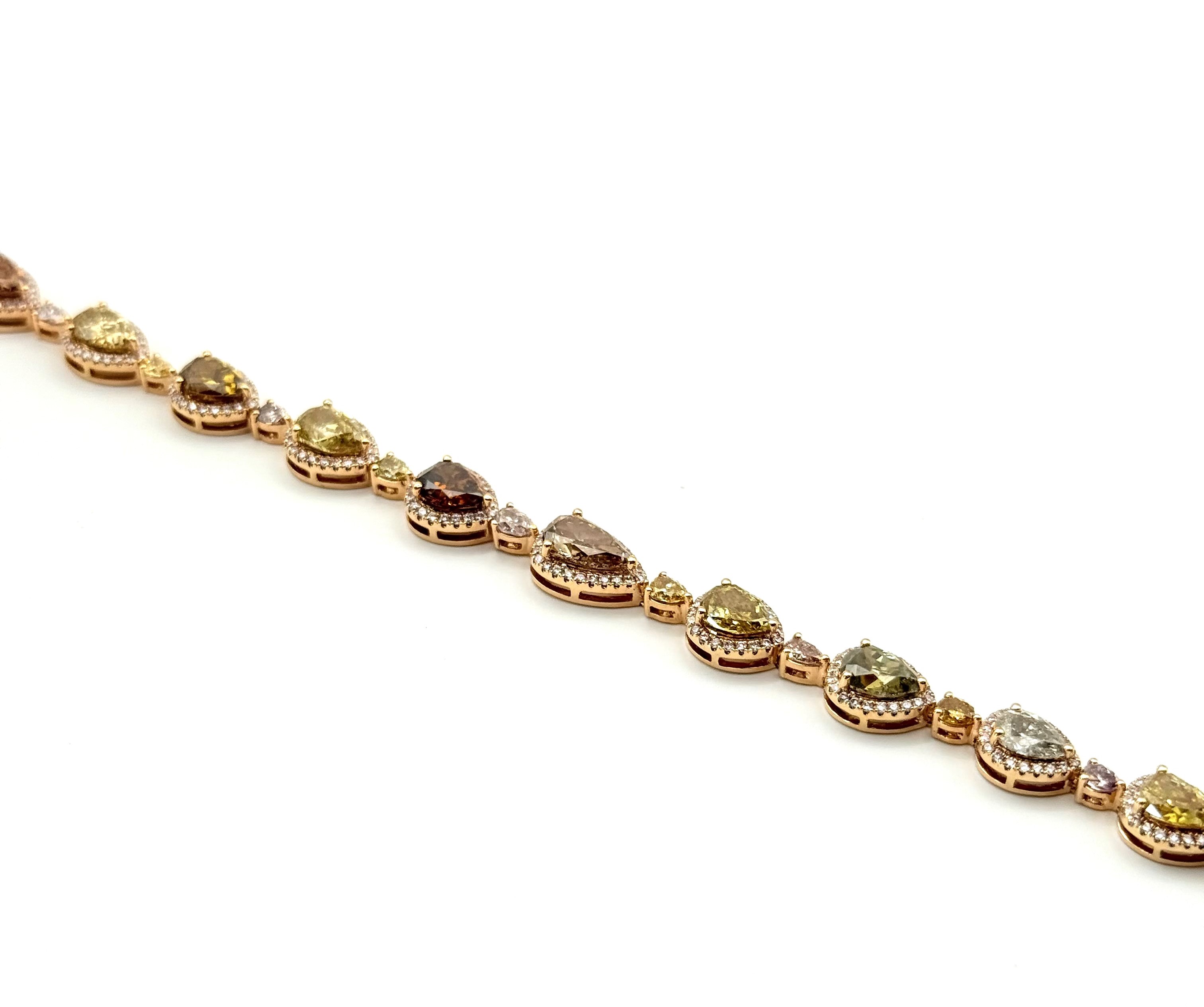 18 Karat Rose Gold Bracelet With 28=10.10Tw Pear Diamonds And 288=1.01Tw Round Pink Diamonds
Serial #: 572041