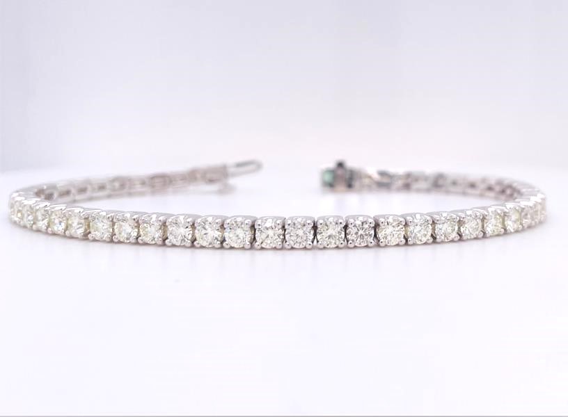 14 Karat White Gold Tennis Bracelet With 52=6.00Tw Round Diamonds
 Length/Size: 7