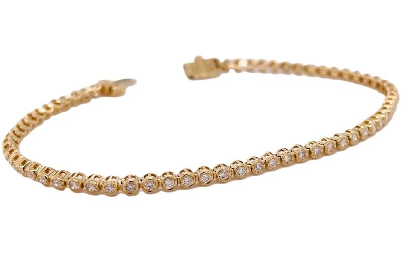 14 Karat Yellow Gold  Tennis Bracelet With 66=0.86Tw Round Diamonds 
Length/Size: 7''