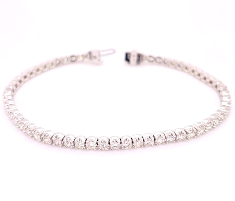 14 Karat White Gold Tennis Bracelet With 60=3.00Tw Round Diamonds 
Length/Size: 7''