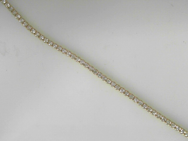 14 Karat Yellow Gold Tennis Bracelet With 60=3.00Tw Round Diamonds 
Length/Size: 7''