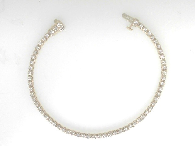 14 Karat Yellow Gold Tennis Bracelet With 60=0.90Tw Round  Diamonds 
Length/Size: 7