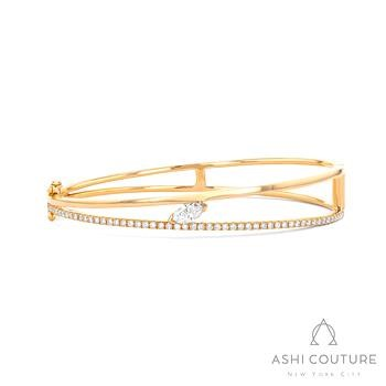 18 Karat Yellow Gold Couture Paradox Marquise 2-Row Bangle 1.00 Ct
7 Inch