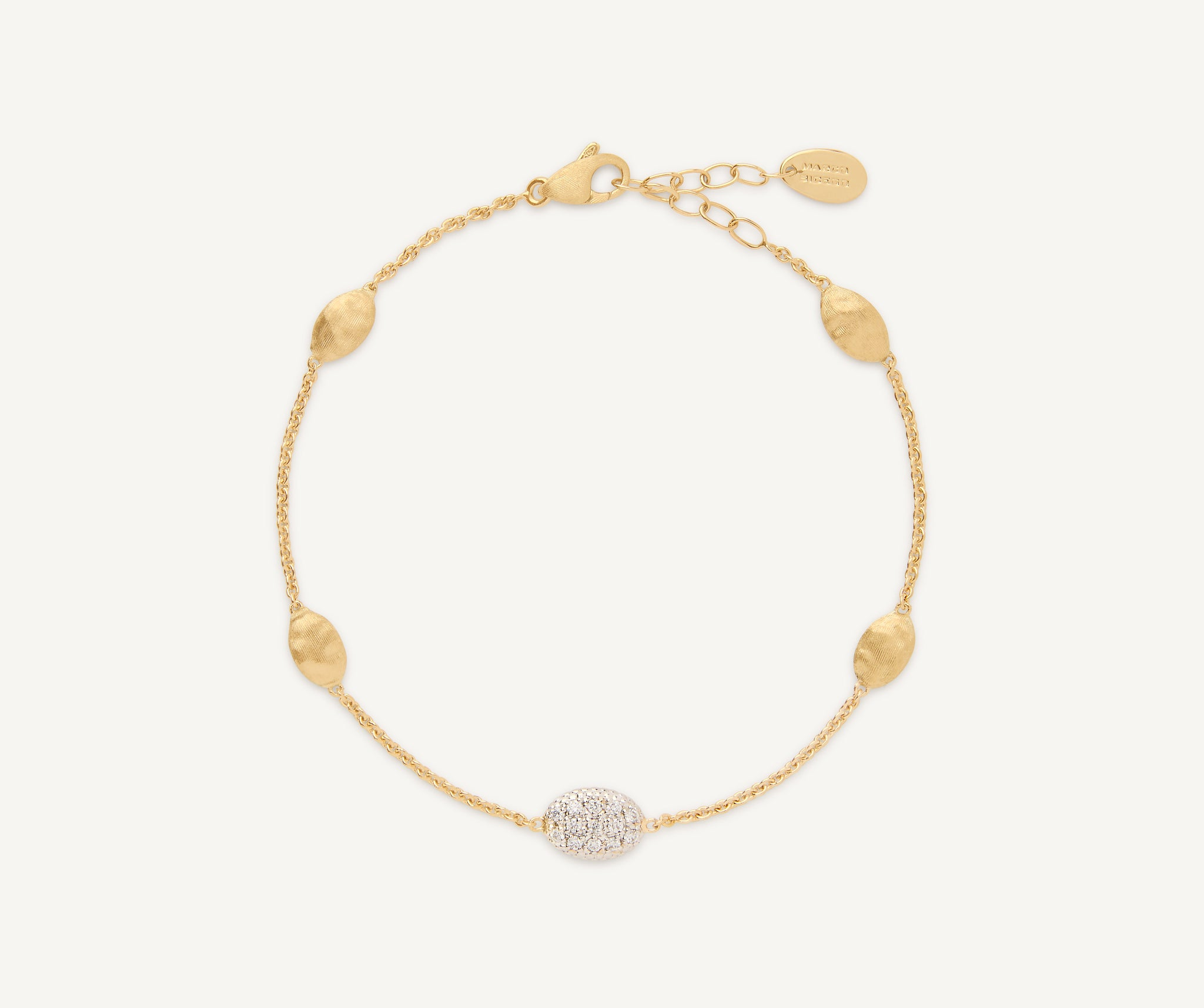 Marco Bicego 18 Karat Yellow/White Gold Siviglia Pave Diamond 0.17 Ct Small Bean Station Bracelet
6.25 Inch With Extender