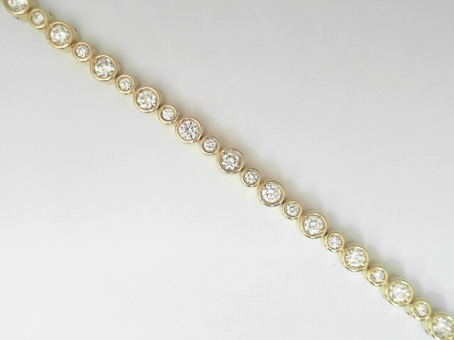 14 Karat Yellow Gold Round Brillinat Cut Diamond Line Bracelet 2.69 Cts
Length/Size: 7 Inch