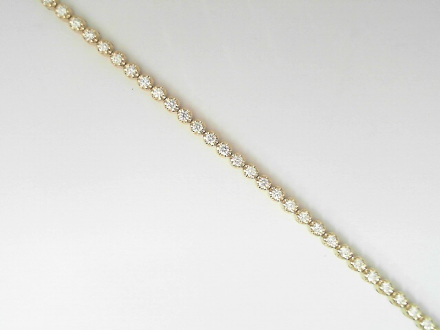14 Karat Yellow Gold Round Brillinat Cut Diamond Line Bracelet 1.15 Cts
Length/Size: 7 Inch