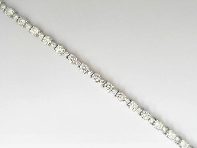 14 Karat White Gold Round Brillinat Cut Diamond Line Bracelet 4.15 Cts
Length/Size: 7 Inch