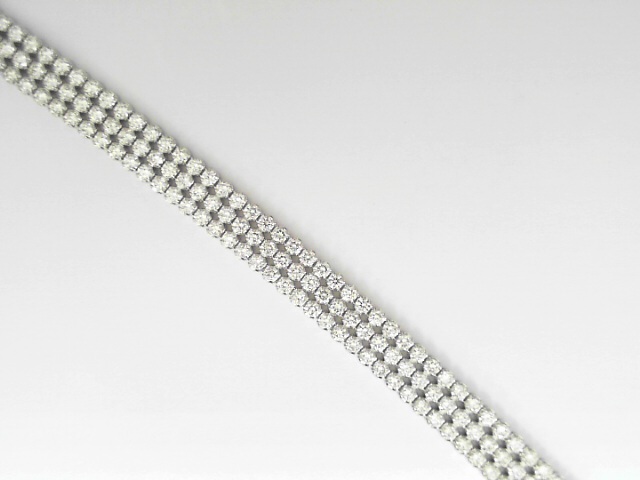 14 Karat White Gold Triple Row Round Brillinat Cut Diamond Line Bracelet 5.20 Cts
Length/Size: 7.5 Inch