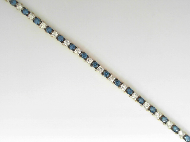 14 Karat Yellow Gold Treited Blue Round Brilliant Cut Diamond Line Bracelet 2.99 Cts
Length/Size: 7 Inch