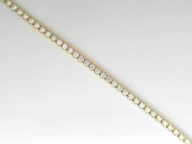 14 Karat Yellow Gold Round Brilliant Cut Diamond Line Bracelet 2.01 Cts
Length/Size: 7 Inch