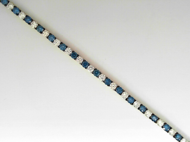 14 Karat Yellow Gold Treated Blue Round Brilliant Cut Diamond Line Bracelet 4.20 Cts
Length / Size: 7 Inch