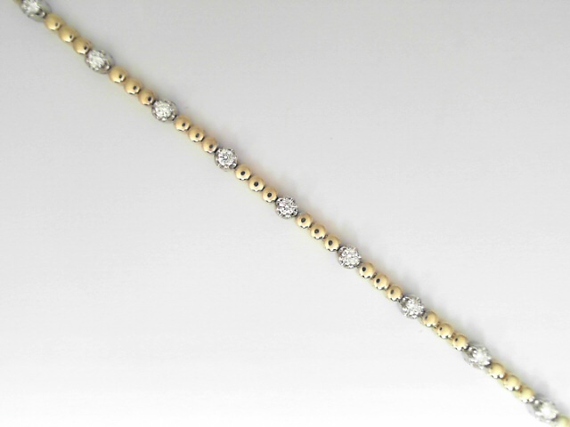 14 Karat Yellow And White Round Brilliant Cut Diamond Line Bracelet 0.55 Cts 
Length / Size: 7 Inch