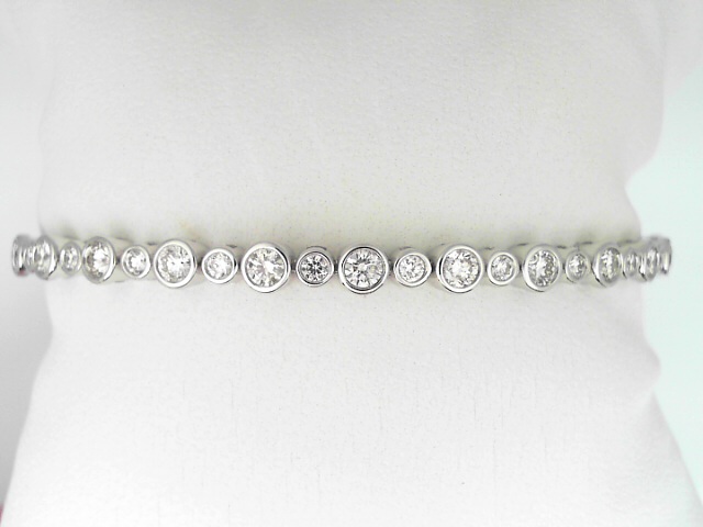 14 Karat Yellow And White Gold Round Brilliant Cut Diamond Flexible Bangle Bracelet 1.41 Cts 
Size: 6.75