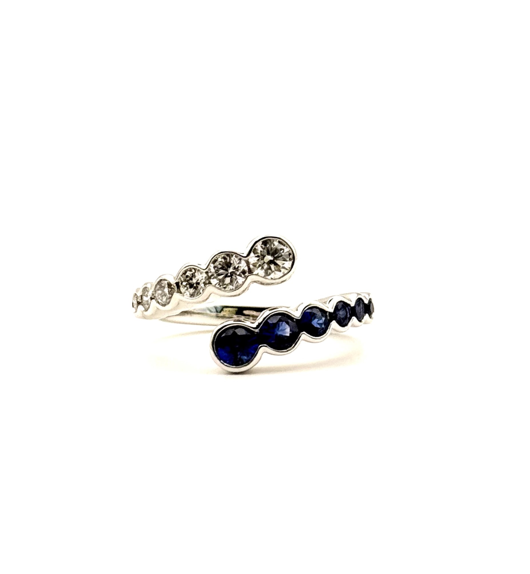 Charles Krypel18 Karat White Gold Bypass  Ring With 6=0.68Tw Round G/H Vs-Si Diamonds And 6=0.74Tw Round Sapphires Name: bezel set
Ring Size: 6.5