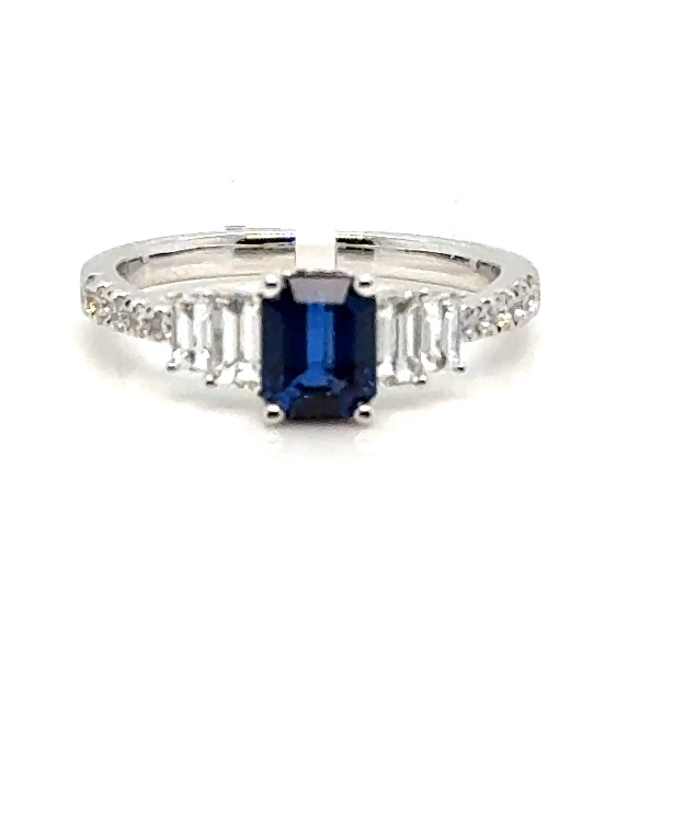 18 Karat White Gold 1.20 Cts Emerald Cut Sapphire And 0.65 Ct Baguette/Round Brilliant Cut Diamond Ring 
Ring Size: 6.50