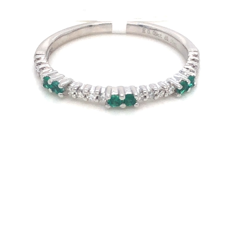 18 Karat White Gold Band With 6=0.09Tw Round Emeralds And 16=0.11Tw Round Diamonds 
Ring Size: 6.5