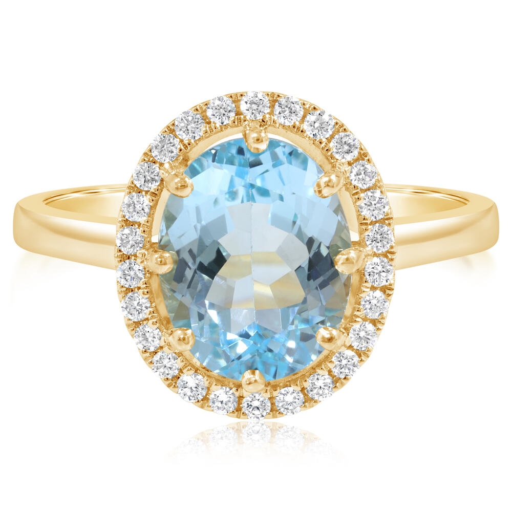 14 Karat Yellow Gold Halo Fashion Ring With One 3.13Ct Oval Blue Topaz And 26=0.18Tw Round G SI1 Diamonds 
Ring Size: 7