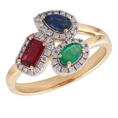 14 Karat Yellow Gold Ring With One 0.35ct Emerald Cut Ruby One 0.30ct Pear Sapphire, One 0.21ct Oval Emerald And One 0.06ct Round Diamond
Clarity Enhanced Gemstones
Size 7