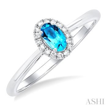 10 Karat White Gold 5X3 Oval Blue Topaz Single Cut Round Diamond Halo Ring 0.07 Ct
Ring Size : 6.5