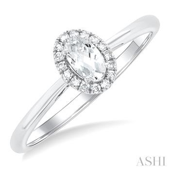 10 Karat White Gold 5X3 Oval White Topaz Single Cut Diamond Halo Ring 0.07 Ct
Ring Size : 6.5
