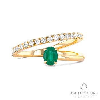 18 Karat Yellow Gold Couture 5 X 4 Oval Emerald And 0.35 Ct Diamond Bypass Ring 
Size 7