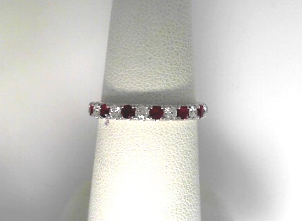 14 Karat White Gold Ruby Wedding Band With Round Brilliant Diamonds 0.25Tw
Ring Size: 6